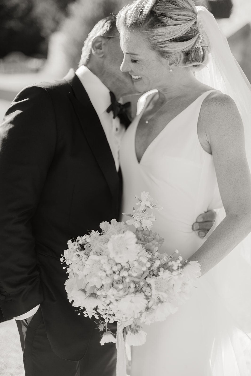 bride and groom kiss